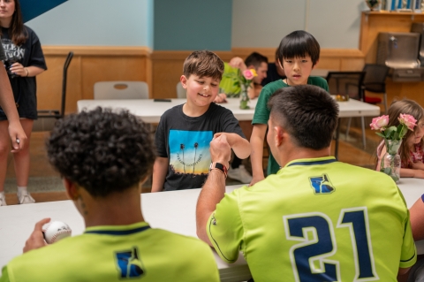 Kids with Nighthawks players